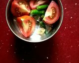 A picture of step 2 of Tomato uttapam.