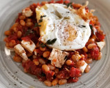 Foto del paso 7 de la receta: Fessolets con tomate y queso feta al horno con huevo frito