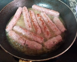 Foto del paso 3 de la receta: Bocadillo de salchichas con queso al vino dulce