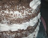 A picture of step 18 of Two tier vanilla and chocolate cake 🎂.