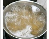 A picture of step 1 of Cheesy Chicken Pasta.