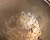 A picture of step 2 of Chicken Arroz Caldo.