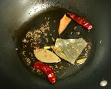 A picture of step 4 of Mochar Ghonto (Banana Blossom Curry).