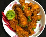 A picture of step 7 of Green Mango Chicken Curry.