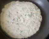 A picture of step 3 of Rava Sooji Chilla.