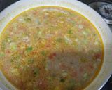 A picture of step 4 of Egg drop veggies soup.