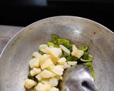 A picture of step 2 of Shimla mirch potato sabji.
