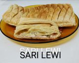 Foto del paso 4 de la receta: Comida caliente día 1>Segundo plato>Hojaldre de jamón, queso y perejil