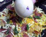 Foto del paso 6 de la receta "Huevos rotos con jamón" en versión avestruz