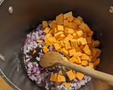 A picture of step 2 of Sweet potato and coconut green thai curry soup.