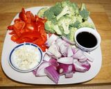 A picture of step 3 of Lomo Saltado with Broccoli and Red Bell Pepper.