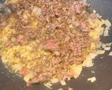 A picture of step 2 of Lebanese style spaghetti with minced meat and red sauce.