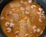 Foto del paso 4 de la receta Merluza en salsa verde con almejas y gambas