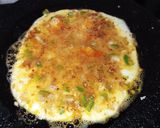 A picture of step 4 of Peri peri cheese omlette.