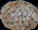 A picture of step 1 of Sig's Gouda cheese and spring onion omelette.