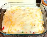 A picture of step 4 of Fish mix with sweet peppers in white sauce.