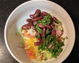 A picture of step 4 of Mexican quinoa salsa in cucumber pockets.