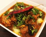 A picture of step 9 of Kadai Chicken.