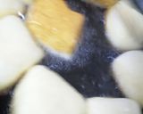 A picture of step 5 of Hawaiian Malasadas.