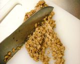 A picture of step 1 of Raw Chrysanthemum Greens with Mustard Daikon Radish Natto.
