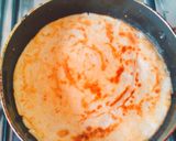 A picture of step 5 of Fried Eggs​ with Milk.