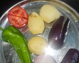 A picture of step 1 of Bharela Ringda Batata with soft roti(kathiyawadi sabzi).