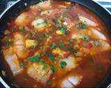 Foto del paso 8 de la receta: Fideuá de merluza y calamar al horno