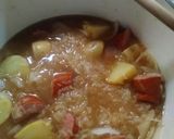 A picture of step 9 of Sauerkraut and polish kielbasa.