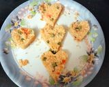 A picture of step 13 of Tomato Tehri with Heat shape.