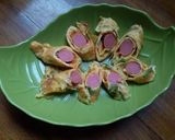 Foto langkah ke 5 dari resep Telur Dadar Gulung Sosis.