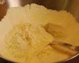 A picture of step 2 of With Apples Cinnamon and Walnut Cake.
