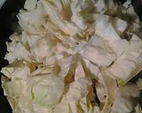 A picture of step 1 of Rice sticks, cabbage, and peas.