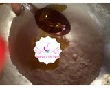 A picture of step 4 of Chocolate stuffed Puff Puff🍫🍩.