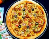 A picture of step 11 of Chicken pizza.