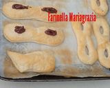 Foto del passaggio 5 della ricetta Maschere di Carnevale di sfoglia con crema alle nocciole con zucchero a velo fatto in casa 🏡👩‍🍳❤️🎭🎭🎭🎭