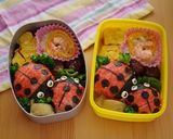A picture of step 4 of Ladybug Onigiri Bento.
