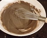 A picture of step 9 of Baked Chocolate Glazed Donuts.