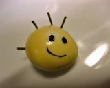 A picture of step 5 of Charaben Easy Snoopy Rice Ball.
