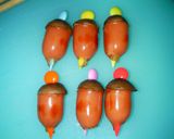 A picture of step 5 of Bento Acorns with shimeji mushrooms and wiener sausages.