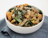 A picture of step 5 of Butternut Squash and Kale Fusilli Pasta with Ricotta and topped with Fried Sage and Parmesan.