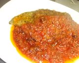A picture of step 7 of Herb Breaded Chicken Breast Served in Tomato Sauce.