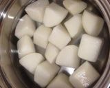 A picture of step 3 of Simmered Daikon & Atsuage Seasoned With Consomme.