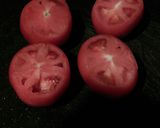 A picture of step 1 of Hot Caprese Style Stuffed Tomatoes.