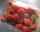A picture of step 1 of Preserve Small Strawberries in Strawberry Preserve and Syrup.