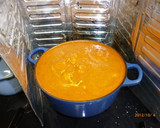 A picture of step 6 of Simple Butter Chicken Curry using a Hand Blender.