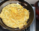 A picture of step 3 of Cheesy Bread Omelette.