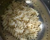 A picture of step 1 of Cheese tomato macaroni pasta.