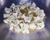 A picture of step 1 of Masala phool gobi.