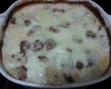 A picture of step 7 of Ladybirds Garlic & Sausage Potato Bake.