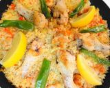 A picture of step 6 of Outdoor Cooking Recipe - Chicken Drumettes Paella.